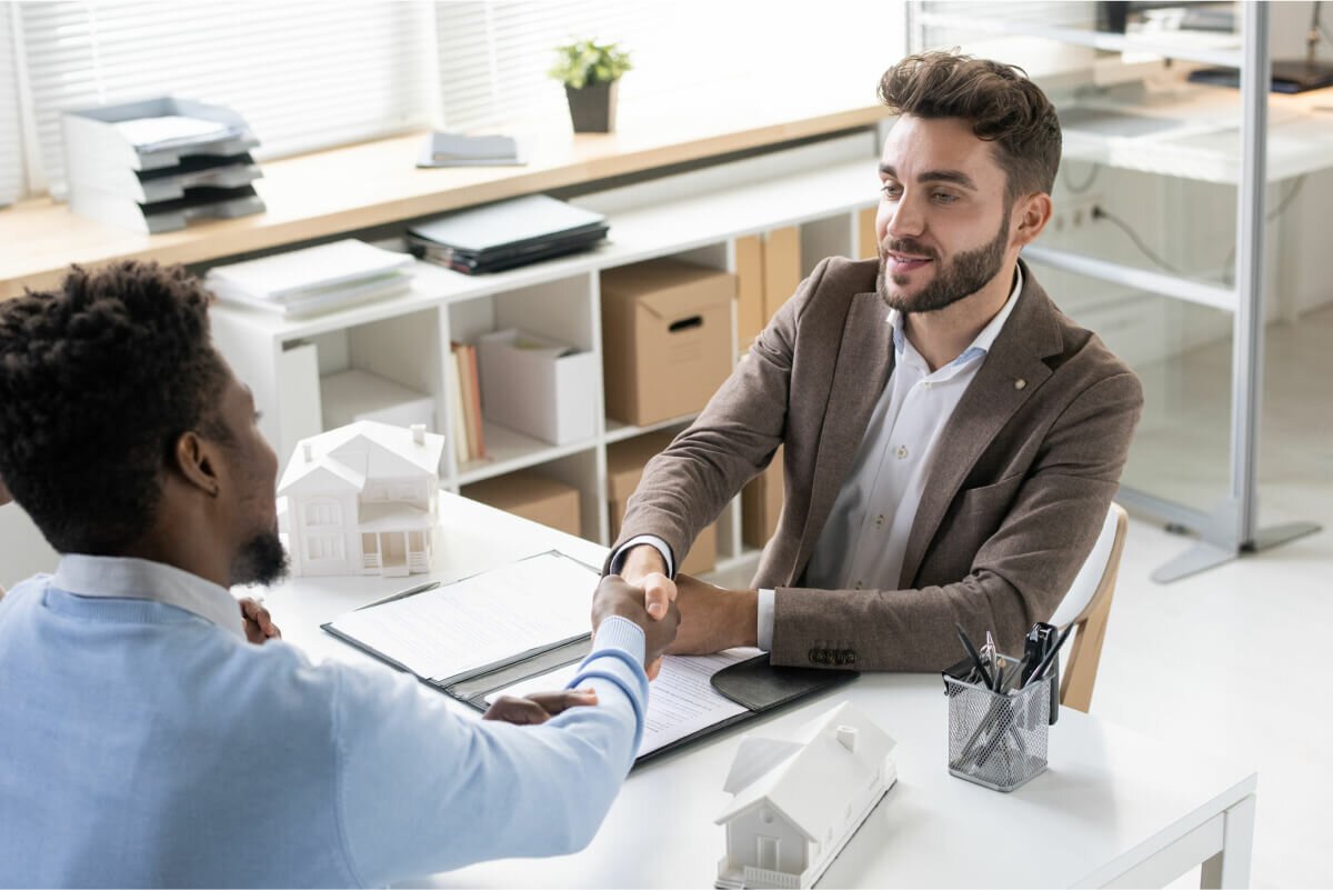 A couple reviewing a home loan agreement